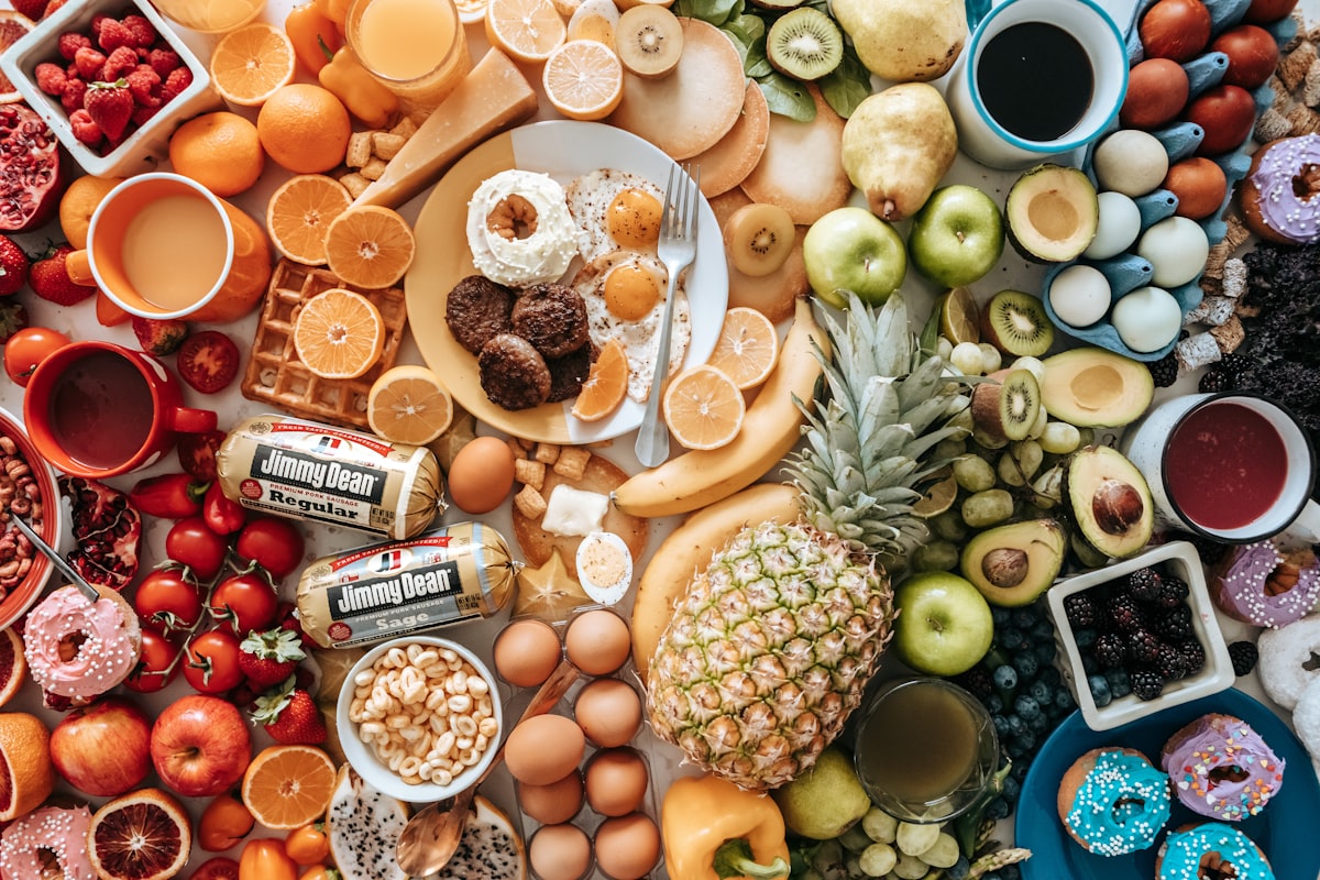 Variety of vitamin sources including fruits, vegetables, and supplements